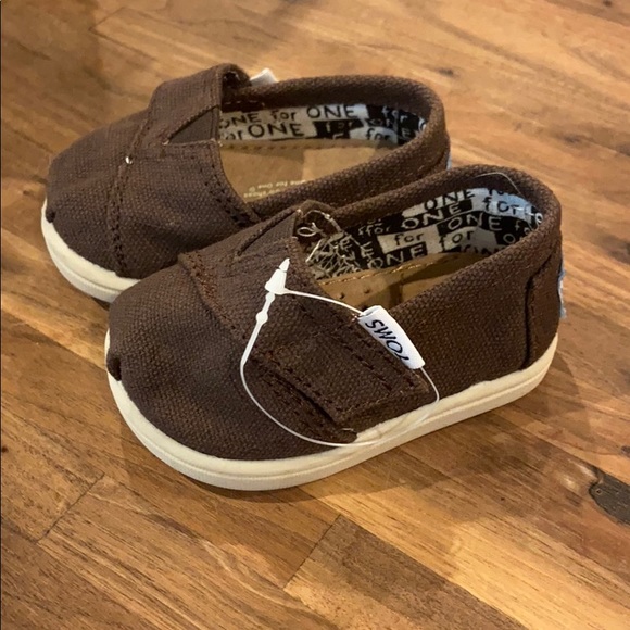 Toms Other - Baby shoes size 2 tiny TOMS brown canvas classic